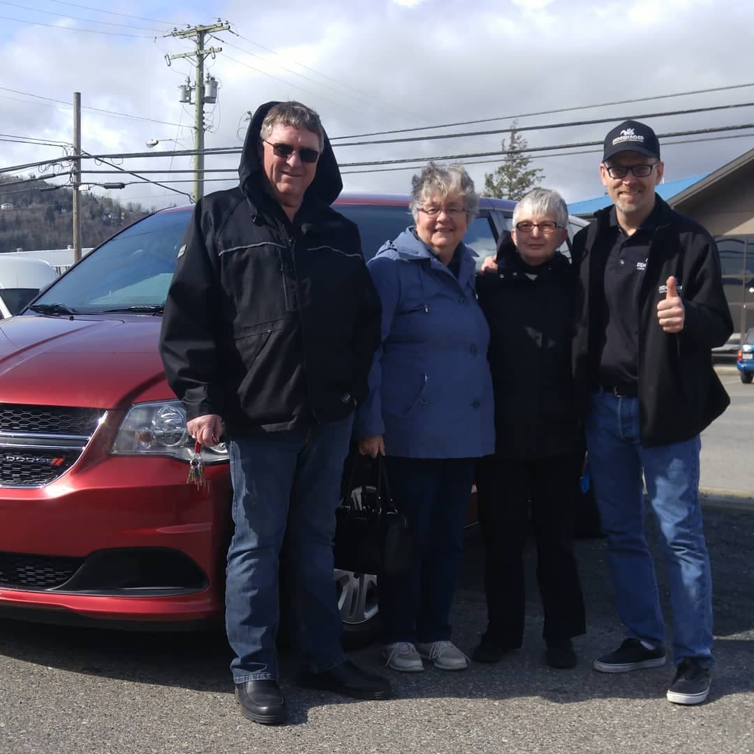 Customers with their converted van outside Sidewinder