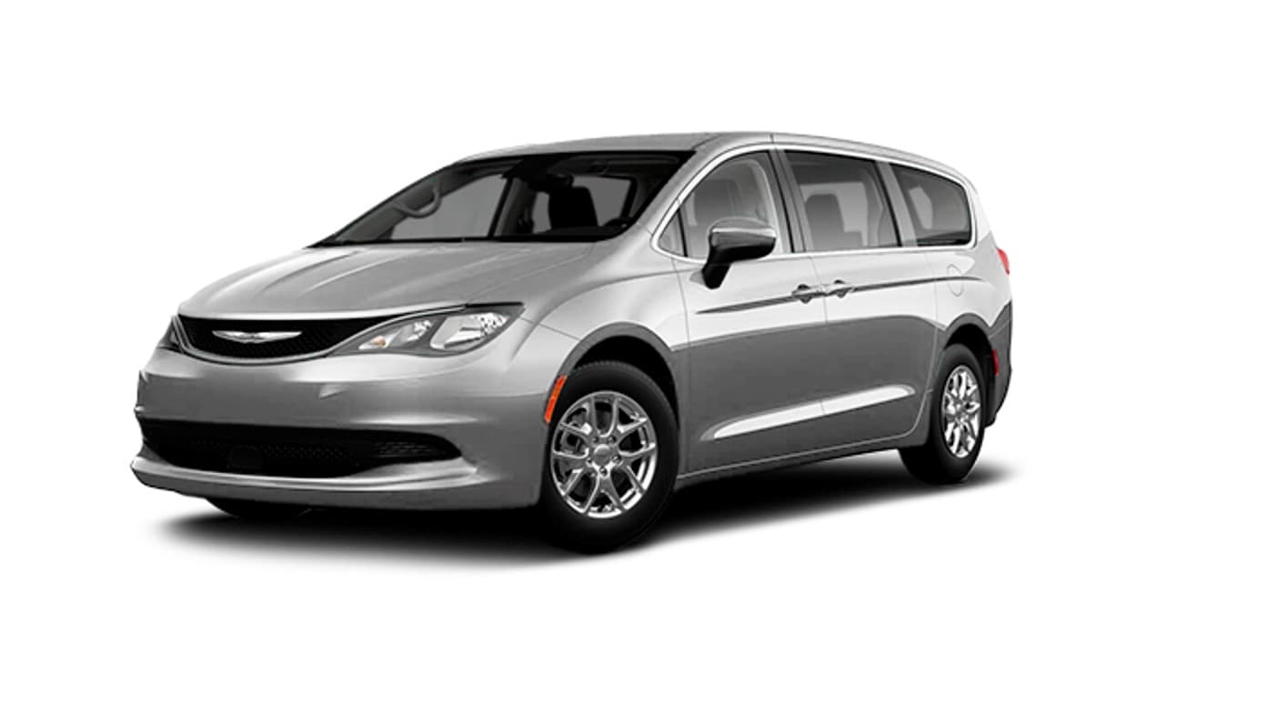 Manufacturer image of the base vehicle before conversion: a Chrysler Grand Caravan SXT in silver, front three-quarter view, with no ramp or lowered floor fitted
